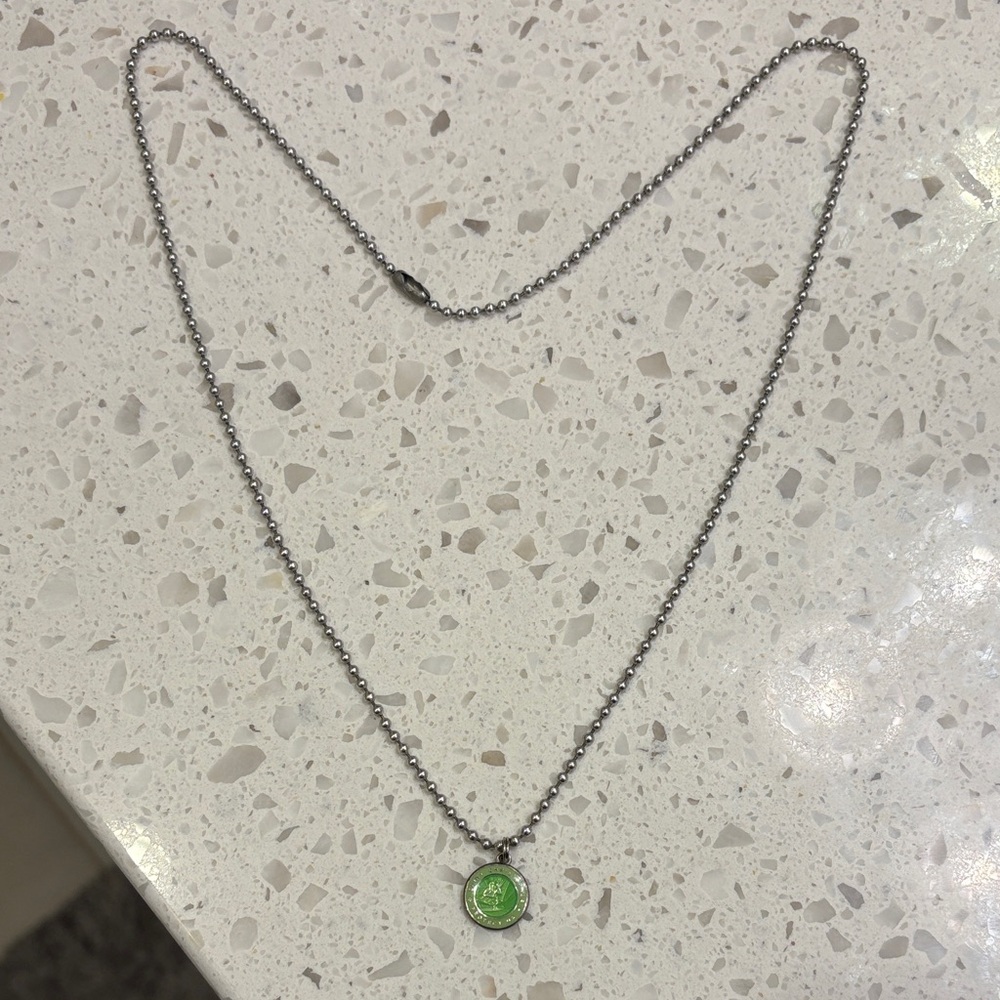 Elegant Silver Necklace with Green Pendant